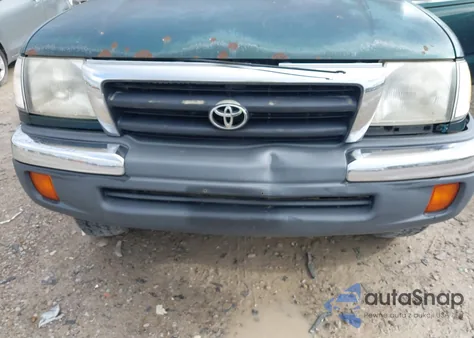 1999 Toyota Tacoma из США, поврежденный, VIN 4TAPM62N1XZ514312